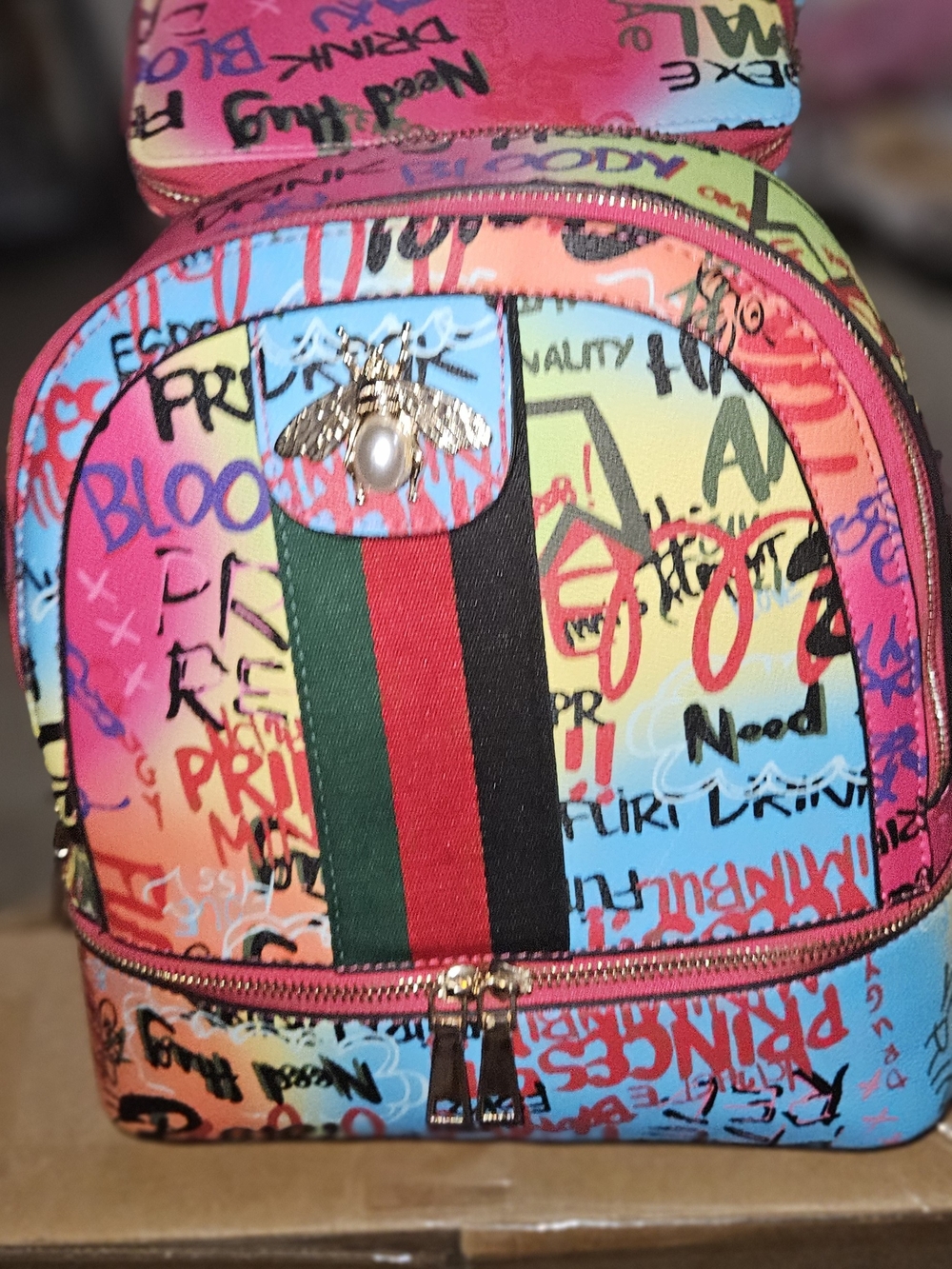 Accessorize Multicolor Graffiti Backpack with Pink, Blue, Yellow & Green